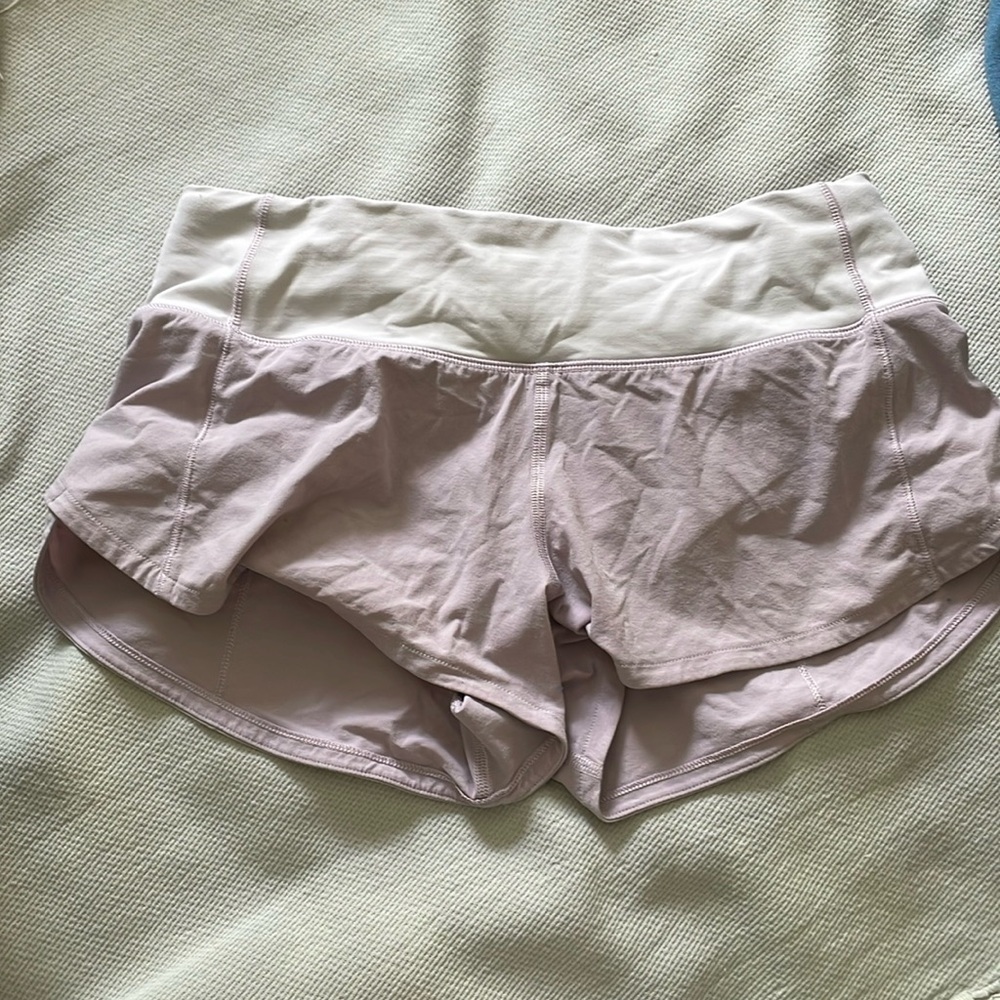 size 2 light pink/purple lululemon shorts worn a couple of times